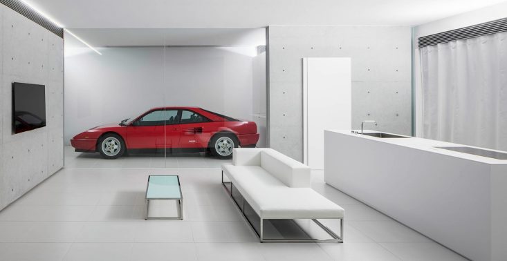 Ten japoński dom to raj dla wszystkich fanów minimalistycznej architektury i... drogich samochodów<